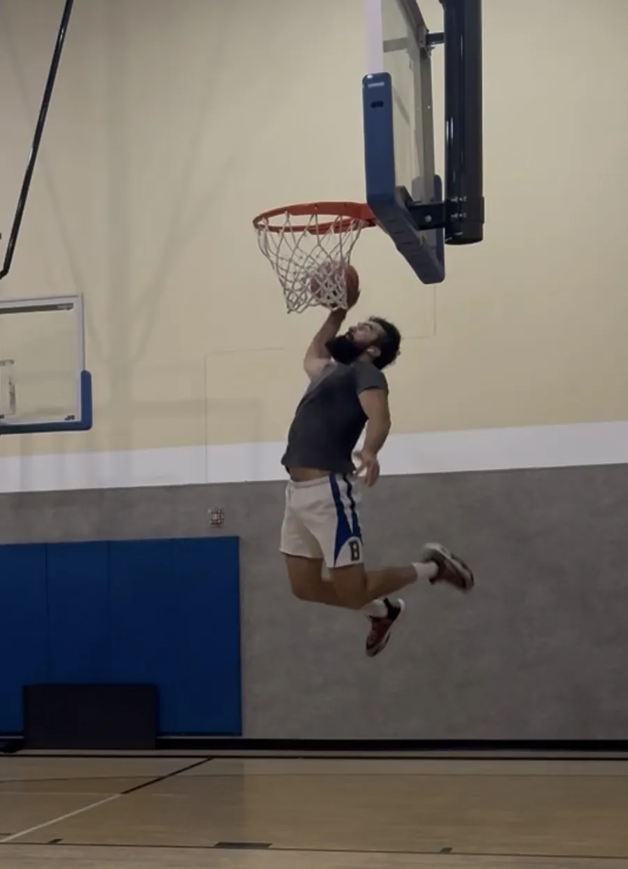 Coach Khush elevating for a dunk